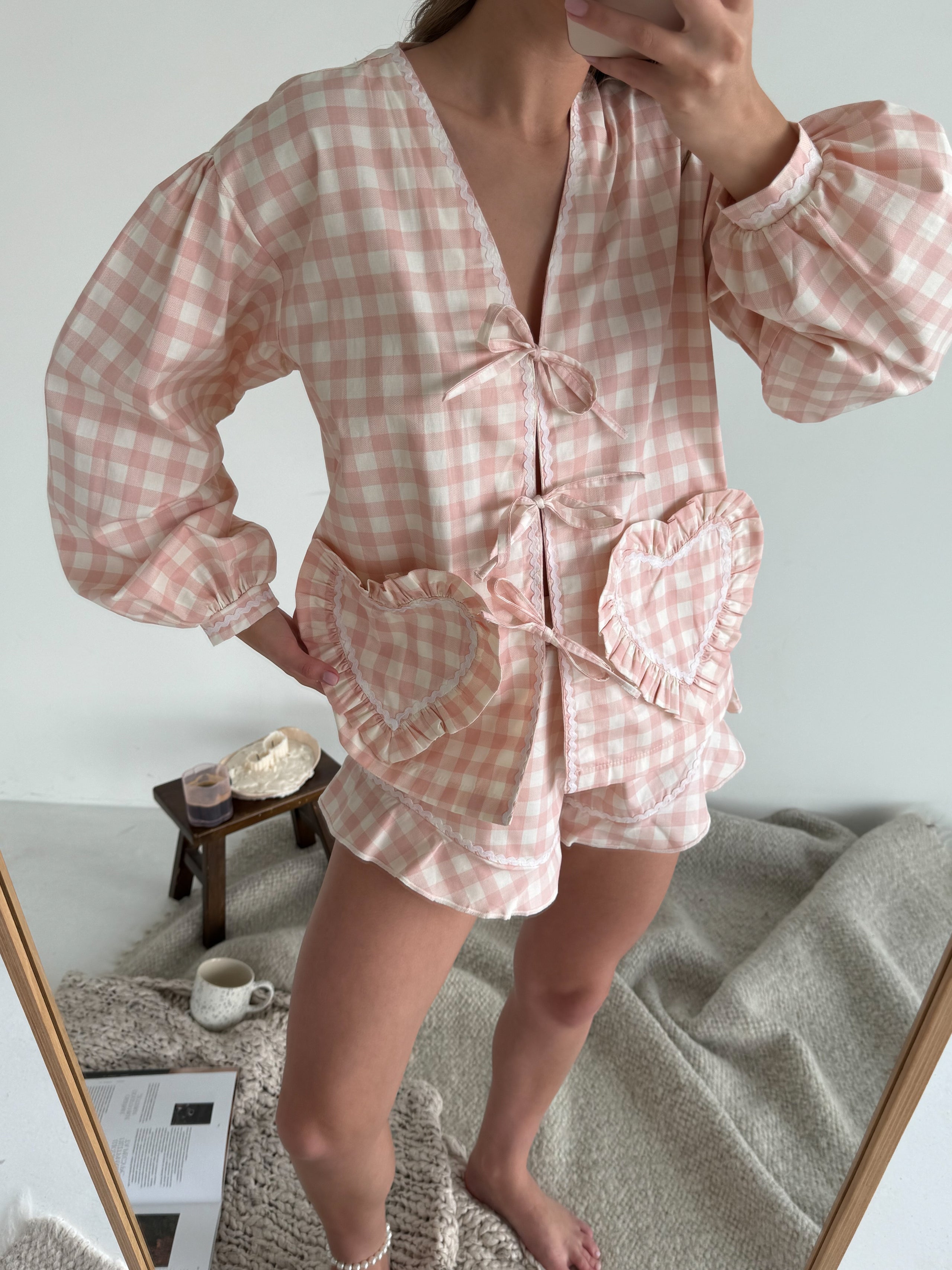 Suit with powder-colored hearts