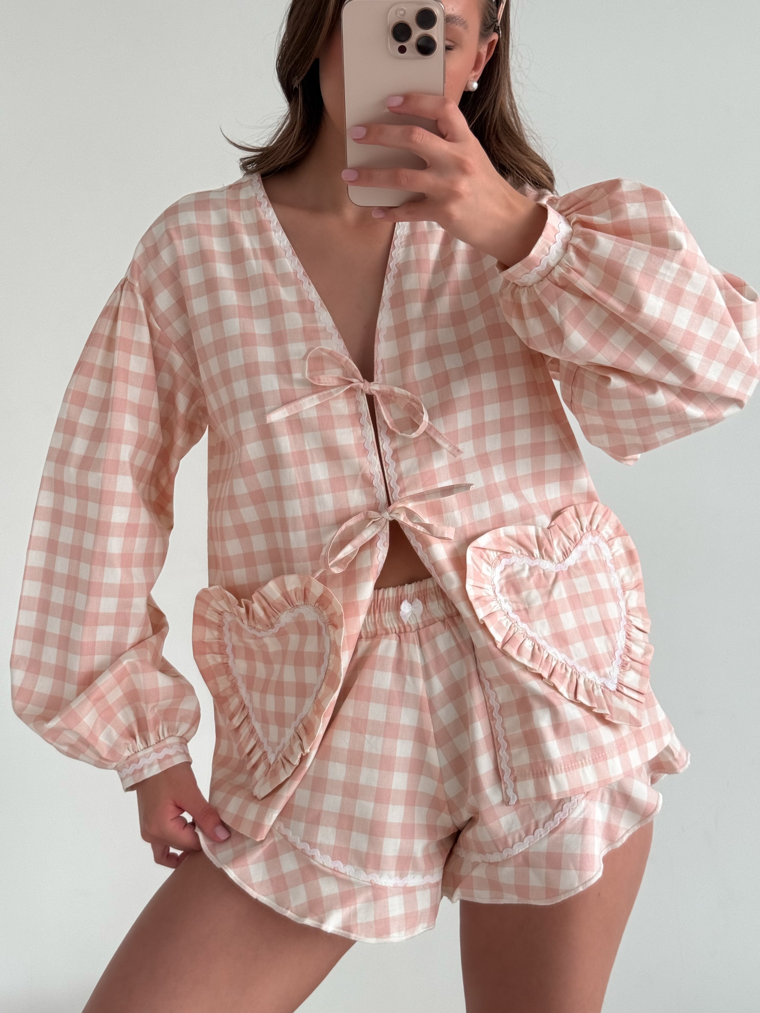 Suit with powder-colored hearts